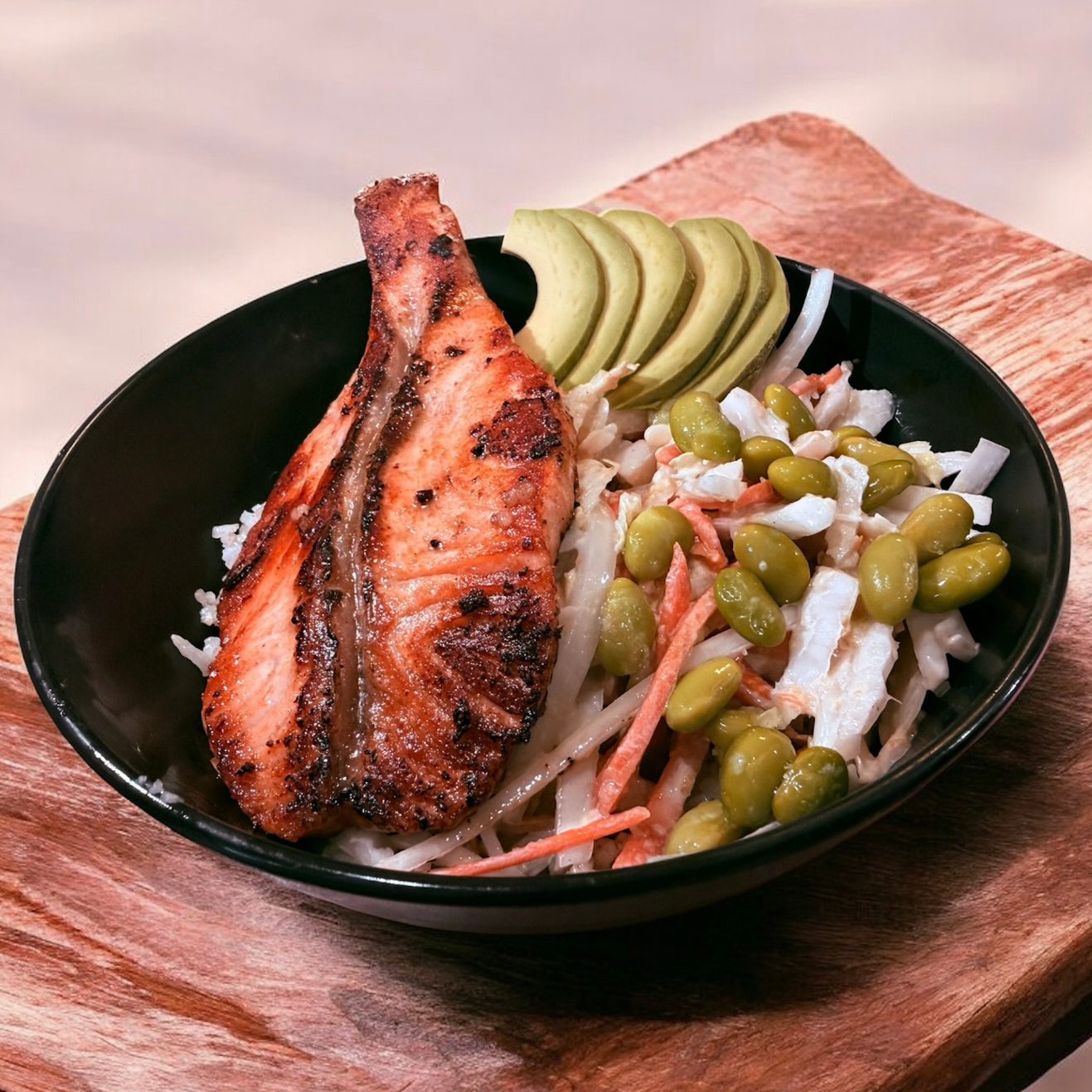 Cooked Seared Salmon Garlic Fried Rice Bowl.